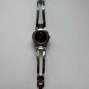 MINT CONDITION MOVADO LADIES WATCH (FACTORY SET NATURAL DIAMONDS)